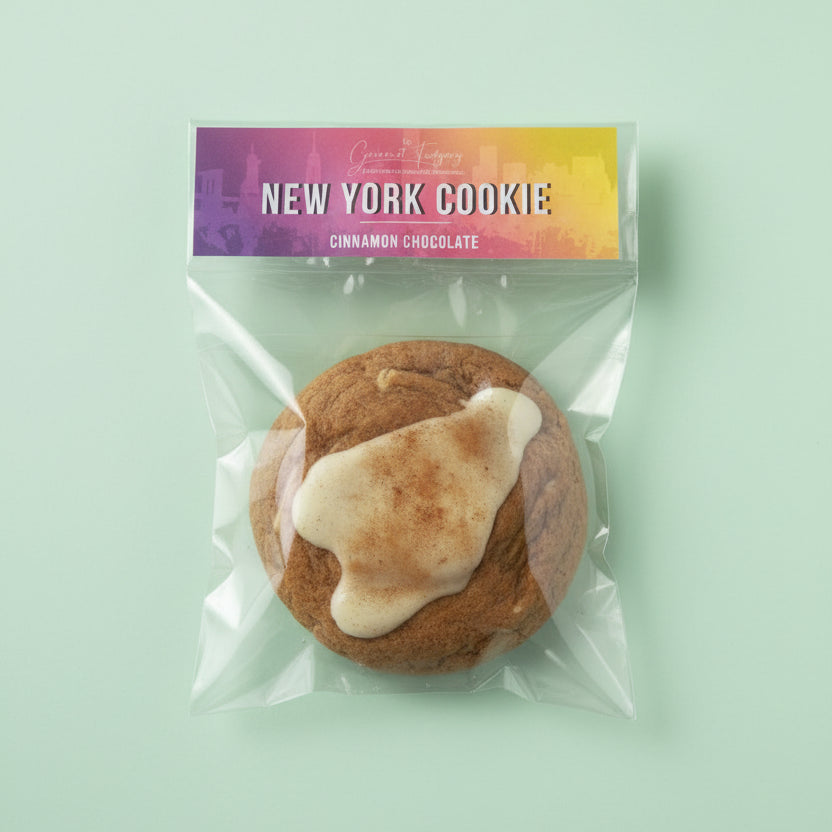 New York cookie with cinnamon and chocolate flavor in clear packaging on a mint background